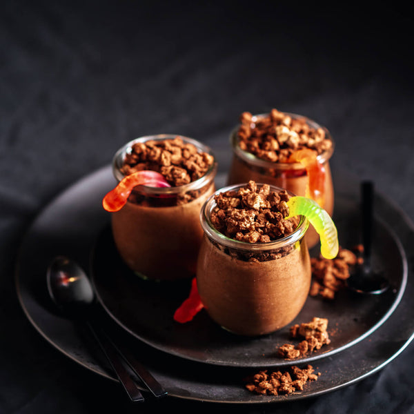 Chocolate mousse swarming with worms